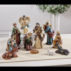 a group of figurines sitting on top of a table