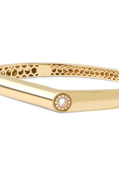 Turn to Rainbow K for statement-making pieces like the Grace bangle. Made from 14kt yellow gold with point-cut white diamonds, this structured design will bring some dazzle to any ensemble. Material: 14K Yellow Gold Stones: White diamonds 0,31cts 16 cm Interested in this or something similar? Contact our jewelry concierge at 512-347-9488. All jewelry and accessories are considered final sale and may not be returned or exchanged. Modern Gold Bracelet With Single Cut Diamonds For Wedding, Diamond Bangle With Single Diamond For Wedding, Single Diamond Bangle For Wedding, Wedding Bangle With Single Diamond, Modern Yellow Gold Diamond Bracelet With Single Diamond, Formal 14k Gold Bangle With Single Cut Diamonds, Yellow Gold Diamond Bangle With Brilliant Cut, Formal Diamond Bangle With Single Diamond, Modern Hand Set Bangle For Formal Occasions