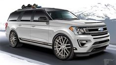 a white ford expedition vehicle driving down a road with snow covered mountains in the background