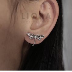 These Silver Dragonfly Stud Earrings are elegant and sophisticated. Made from sterling silver, they capture the essence of the dragonfly with intricate detailing and a polished finish. Lightweight and comfortable, perfect for any occasion. * Design: Dragonfly * Material: High-quality 925 sterling silver. * Tarnish resistant + Hypoallergenic * Size: 15x20 mm * Complimentary Gift Wrapping * Worldwide Tracked Delivery * Returns & exchanges accepted Next-Day Delivery Service. Orders placed before 12 Dragonfly Gifts, Dragonfly Jewelry, Dragonfly Earrings, Animal Earrings, Jewelry Earrings Studs, Etsy Earrings, Essence, Jewelry Earrings, 925 Sterling Silver