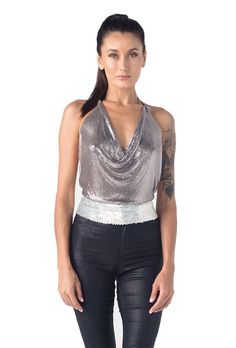 Metal halter top. Special shinny disco ball kind of metal material protected by fabric at the edges. Kayo original lotus flower metal piece at the neck for embellishment. Adjustable chain at the neck and back. Limited edition All one size Summer Party Metallic Halter Top, Metallic Halter Top For Summer Party, Evening Party Season Halter Neck Tank Top, Disco Shimmer Tops For Club, Sequined Halter Top For Party, Glamorous Metallic Halter Top For Night Out, Metallic Disco Crop Top For Party, Metallic Disco Tank Top For Night Out, Disco Metallic Crop Top For Party