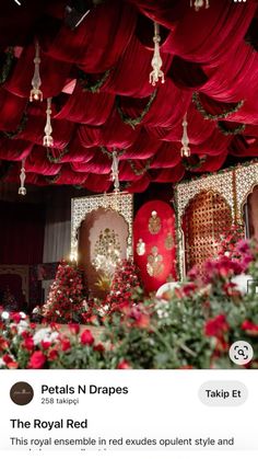 the royal red room is decorated with festive decorations and draping for christmas