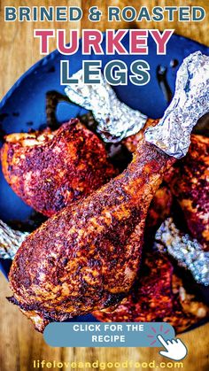 grilled and roasted turkey legs on a blue plate with text overlay that reads, primed & roasted turkey legs click for the recipe