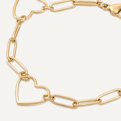 This charming piece features a series of open-heart charms connected by modern gold-plated links, creating a beautiful balance of romance and contemporary style. The delicate yet bold design makes this bracelet perfect for everyday wear or special occasions. Crafted with 18K gold-plated material, this bracelet is water-proof, tarnish-free, and hypoallergenic. The adjustable clasp ensures a secure and comfortable fit, making it an essential accessory for those who love to wear their heart on thei Clasp Bracelet, Bracelet Clasps, Open Heart, Bold Design, Heart On, Water Proof, Ring Necklace, Heart Charm, Necklaces Bracelets