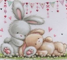 two stuffed animals sitting next to each other in the grass with hearts and bunnies