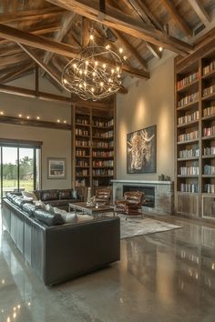 a living room filled with furniture and a fire place in the middle of a room