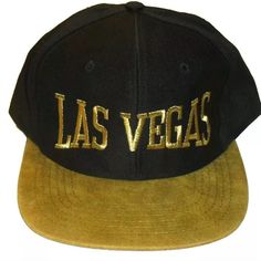 Brand New Mens 90s Vintage Las Vegas Snapback Hat. The Bill Is All Soft Suede Material. The Hat Is Black With The Las Vegas Embroidered Text Logo In Gold. Casual Gold Snapback Hat With Flat Brim, Casual Gold Flat Bill Hat, Gold Casual Baseball Cap For Streetwear, Casual Gold Flat Brim Baseball Cap, Gold Snapback Hat With Flat Brim For Streetwear, Gold Flat Bill Hat For Streetwear, Casual Gold Snapback Hat, Gold Baseball Cap For Streetwear, Vintage Snapback Hat With Embroidered Logo