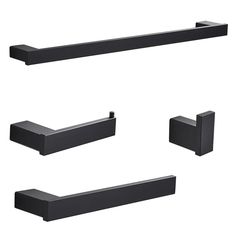 three black bathroom accessories including soap dispenser, towel bar and toilet paper holder