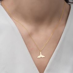 14K Gold Fish Tail Necklace, 925 Silver Whale Tail Necklace, Fish Tail Pendant, Whale Tail Charm, Mermaid Tail Pendant Handmade Fish Tail Pendant Material: 925 Sterling Silver or 14K Gold Chain Length: 17 inches - (45cm) / 19 inches - (50cm) / 21 inches - (55cm) Chain Style: Cable Colour: Rose - Silver - Gold Pendant Size: 1,50cm X 1,28cm Minimalist Whale Tail Charm We Are a Jewelry Manufacturer, We Do Wholesale Click the link below for similars: https://www.etsy.com/shop/Dzgsilver?ref=seller-pl Sterling Silver Fish-shaped Jewelry, Sterling Silver Fish-shaped Necklace With Lobster Clasp, Whale Tail Necklace, Mangalsutra Design, Minimal Gold, Jewelry Manufacturer, Anchor Necklace, Gold Fish, Fish Tail