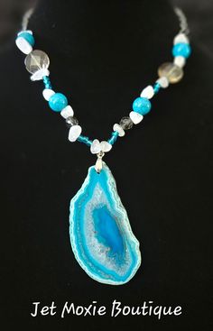 The artists at the Jet Moxie Boutique have designed many beautiful, unique, handmade beaded necklaces. There are many to choose from. Check back often as other items will be added as completed. Reasonably priced. Necklaces are made using various materials, with whatever the artist finds interesting.  The seller does not ship outside of the United States. Handmade Blue Mineral Crystal Necklace, Unique Turquoise Glass Necklaces, Unique Blue Mineral Crystal Necklace, Turquoise Ocean-inspired Necklace With Natural Stones, Unique Ocean Jasper One-of-a-kind Necklace, Magnetic Closure, Handmade Beaded Necklaces, Unique Designs, Beaded Necklace