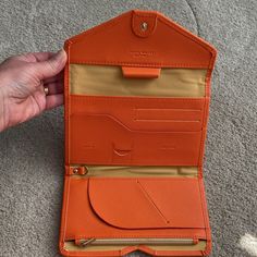 Zoppen Orange Travel Wallet With Snap Closure. New. Never Used. Excellent Condition. No Flaws. Bundle With Any Other Item From My Closet For Discount. Orange Pouch Wallet For Daily Use, Orange Bag With Card Slots For Daily Use, Orange Travel Wallets With Interior Card Slots, Rfid Blocking Travel Wallets In Pouch Shape, Rfid Blocking Travel Wallet Pouch, Orange Travel Wallet With Card Slots, Orange Travel Wallet, Travel Wallet, Travel Wallets