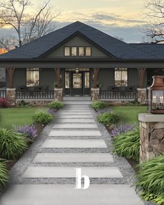 a house with a walkway leading to the front door