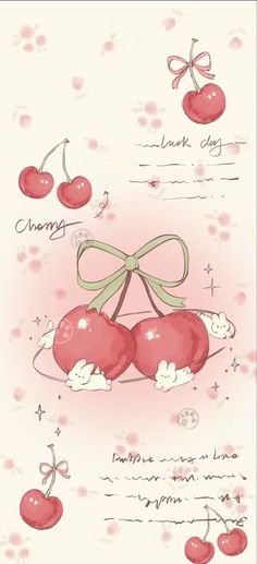 two cherries are tied to a ribbon