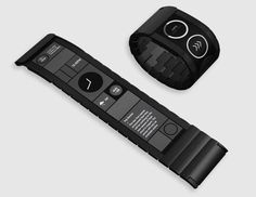 two remote controls sitting next to each other on top of a white surface with black trim