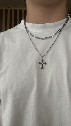 Iconic, voguish silver chains for men that redefine fashion. Our 3mm Rope Shiny Cross necklace is uniquely designed with top-grade stainless steel that promises durability and an appealing shine to complement your outfit. Neither handmade nor , but high-quality neckpiece. Extraordinarily stylish yet robust, suitable for everyone between the ages of 18 and 30. An exclusive gift idea for birthdays and special occasions. Giving always has a new trendier alternative with our collection. #men #silver Chains With Pendants, Men Silver Chain, Streetwear Jewelry, Silver Rope Chain, Paperclip Chain Necklace, Paperclip Necklace, Silver Chain For Men, Mens Silver Necklace, Modern Accessories