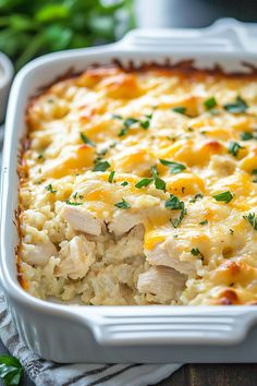 a casserole dish filled with chicken and rice