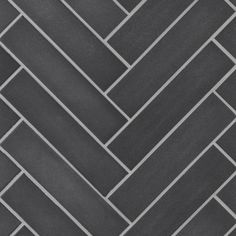 a black and white tile floor with grey lines on the bottom, in an diagonal pattern