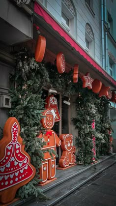 christmas decorations on the outside of a building