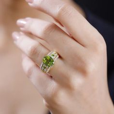 This Hebei peridot and multi gemstone vintage architecture ring, meticulously crafted in sterling silver, features a captivating design inspired by vintage architecture. Centered with a luminous peridot, this silver ring is further enhanced with an array of gemstones that add depth and intrigue to its ornate structure. Luxury Peridot Multi-stone Rings, Luxury Multi-stone Peridot Ring, Luxury Peridot Rings With Accent Stones, Luxury Peridot Jewelry With Accent Stones, Vintage Architecture, Tanzanite Diamond, Gold Chain Jewelry, Signature Jewelry, Sleeping Beauty Turquoise