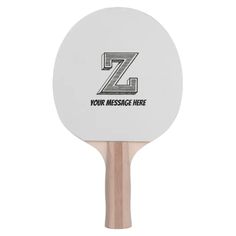 a ping pong paddle with the letter z on it