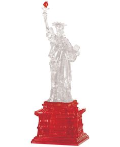 the statue of liberty is made out of red plastic blocks and stands on a white background