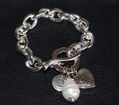 Chunk chain bracelet with heart charm and shell pearl charm, stylish bracelet.  Net weight: less than 100g  Package: simple package. Silver Heart-shaped Pearl Bracelet For Gift, Silver Metal Charm Bracelet With Pearl Charm, Bracelet With Heart, Stylish Bracelet, Pearl Charms, Heart Charm Bracelet, Chain Link Bracelet, Dream Wardrobe, Heart Charm