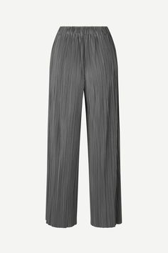 The best-selling Uma trousers by Samsoe Samsoe are relaxed and refined pleated trousers with an elastic waistband. Available in grey, brown, pageant blue, black, oyster, brown, and plum. Wide Leg Bottoms With Folds, Wide Leg Bottoms With Folds For Workwear, Chic Solid Bottoms With Folds, Chic Bottoms With Folds, Chic Wide Leg Bottoms With Folds, Elegant Workwear Bottoms With Folds, Elegant Folded Bottoms For Workwear, Relaxed Fit Pleated Ankle Pants, Elegant Solid Bottoms With Folds