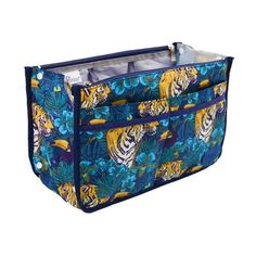 a large blue and yellow bag with tigers on the front, one side is open