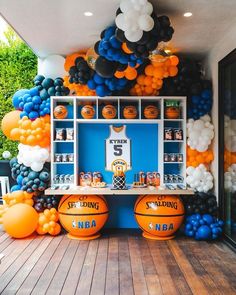 a basketball themed birthday party with balloons and decorations