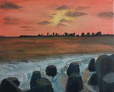 an oil painting of a sunset over the ocean with rocks in the foreground and cityscape in the background