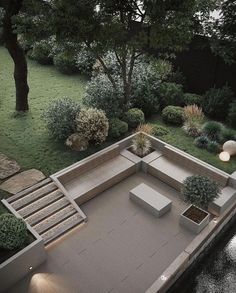 an aerial view of a patio and garden