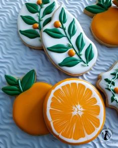 decorated cookies with orange slices and leaves