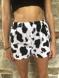 Cow Print Shorts. Great to wear for your next festival. Super cute summer shorts. Super cute and really comfy shorts with a high cut. Made from a 100% cotton fabric with an elastic waist band. Great gift for a birthday, holiday or even a treat for yourself. All of my shorts are made to order so if you have a special request you can leave me a note with your order telling me your exact size specifications. If you don't see your size, if you need the shorts bigger or smaller just tell me and I can Fun Vacation Bottoms With Built-in Shorts, Trendy Bermuda Shorts For Summer, Summer Cotton Short Bloomers, Fun Summer Vacation Bottoms, Fun Vacation Summer Bottoms, Summer Cotton Bloomers Short Style, Summer Cotton Bloomers With Elastic Waistband, Fun Bottoms With Elastic Waistband For Vacation, Fun White Bottoms For Vacation