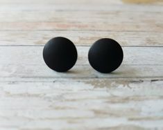 "These round studs are great for everyday wear. Simple and minimalist earrings for him or for her are available in different sizes. They are displayed on beautiful earrings card with saying: \"Keep it simple\". ＡＶＡＩＬＡＢＬＥ ＩＮ ４５ ＣＯＬＯＲＳ Follow this link: ⇨ https://www.etsy.com/listing/709926926 ➤LISTING INCLUDES: ➣ One PAIR of stud earrings ➣ Color: matte black ➣ Diameter: 5 mm, 7 mm, 9 mm, 11 mm or 13 mm (choose from drop down menu) ➤MATERIAL: ☑ polymer clay ☑ Surgical steel or titanium posts (cho Minimalist Black Earrings For Everyday, Minimalist Black Matte Finish Jewelry, Black Minimalist Everyday Earrings, Minimalist Black Round Cartilage Earrings, Chic Black Round Earrings, Black Stud Jewelry For Gift, Black Stud Earrings Women, Single Black Round Earring, Black Round Brilliant Cut Earrings