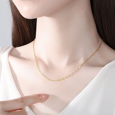 Our gorgeous 14K Gold chain is a classic 2.8mm cut necklace for both men and women. They are beautiful on their own, It gives you a confident feeling and can guarantee you an attractive and luxurious appearance. The modern and trendy gold chain contains 100% real gold material with a stamp for authenticity and it's safe for all skin types. They are nickel-free and their high polished finish gives them a fine 18K shine of purest gold materials. Classic Gold-plated Paperclip Chain Necklace, Elegant Yellow Gold Paperclip Chain Necklace, Paperclip Chain Necklace, Solid Gold Chains, Link Chain Necklace, Own It, Pure Gold, Chain Link Necklace, Paper Clip