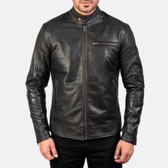 Rev up your style quotient with this black leather biker jacket from COPE WING. The jacket features a full zipper closure and zipped pockets for a sleek look. The mid-length jacket is crafted from real leather and is handmade in Pakistan. It comes with a band collar with a snap button to keep the cold winds at bay. This jacket is perfect for motorcycling, cycling, walking, or CrossFit. The easy rider jacket is available in 2XS to 5XL sizes or custom fit. All sizes are available, and customers can write down their measurements as per the size chart. The jacket is perfect for travel, party/cocktail, or casual occasions. The jacket is fully lined with polyester and can be dry cleaned only. Leather Motorcycle Jacket Women, Mens Leather Jacket Vintage, Leather Trench Coat Woman, Trucker Jacket Men, Aviator Leather Jacket, Shearling Jacket Women, Motorcycle Jacket Women, Cafe Racer Jacket, Black Leather Biker Jacket