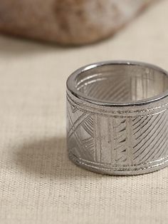 Part talisman, part adornment, the traditional engravings adorning both the inside and outside of this ring are a testament to the traditional craftsmanship of Tuareg artisans.  ETHNOPUR: Ethnopur works with and supports artisans from around the wor Traditional Carved Rings For Ceremonial Occasions, Traditional Carved Ceremonial Rings, Traditional Adjustable Engraved Ring For Ceremonial Occasions, Traditional Adjustable Engraved Ring For Ceremonies, Adjustable Traditional Engraved Ring For Ceremonial Occasions, Bohemian Wide Band Engraved Jewelry, Traditional Ceremonial Ring Jewelry, Traditional Adjustable Engraved Ring, Traditional Adjustable Engraved Etched Ring