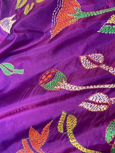 Exclusive hand embroidered Kantha stitch Saree Unstitched Purple Saree With Floral Embroidery, Purple Saree With Floral Embroidery, Multicolor Embroidered Silk Saree Fabric, Embroidered Purple Saree For Puja, Tussar Silk Embroidered Fabric With Multicolor Motifs, Multicolor Embroidered Silk Traditional Wear With Zari Work, Traditional Silk Wear With Multicolor Zari Embroidery, Traditional Silk Wear With Multicolor Embroidery And Zari Work, Unstitched Purple Floral Embroidered Fabric