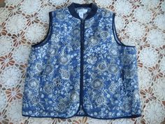 Indigo Blue nylon/poly puffer vest, lightweight, gorgeous blues with floral design, Navy trim accent, Zip front & 2 huge front pockets, size Large, see measurements. Perfect for travel and that extra warmth, this cute vest also has an internal pocket that zips tight. Made by Coldwater Creek SIZE: Large to Extra Large Measurements are taken with the garment laid flat and from side to side in inches. The shoulder to shoulder measurement is taken from one shoulder sleeve seam to the other . Sho Cute Vest, Lightweight Vest, Cotton Vest, Vest Outfits, Chunky Sweater, Coldwater Creek, Puffer Vest, Indigo Blue, Shoulder Sleeve