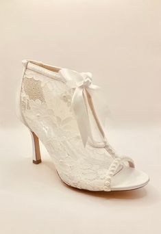 Simply Beautiful White Satin with Lace and Pearl Ribbon Tie Victorian Vintage Wedding Bridal Shoe Ankle Boots Also Available in Ivory Beautiful Satin Heel  Height Approx. 9.5cm  Elegant and Perfect Heel for Comfort Perfect Wedding Day Alternative to the Shoe Sizes: UK 3-8 (EU 36-43) Beautifully Presented Pearl Ribbon, Bridal Boots, Bridal Shoe, Perfect Heels, Victorian Vintage, Satin Heels, Pretty Dress, Ribbon Tie, White Satin