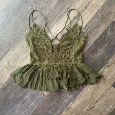 Intimately Free People Adella Cami Top Olive Sparrow New With Tags Size Large Favorite-Ever Bralette, Now As A Cami Featuring A Flowy, Tiered Design To Complement The Intricate Crochet Lace Top. Crisscross Straps A-Line Silhouette Lined Bust Green Lace Camisole Top, Green Lace Trim Top For Vacation, Green Lace Cami Top, Green Lace Bohemian Tops, Green Bohemian Lace Tops, Stretch Lace Top, Free People Adella, Blue Cami, Intricate Crochet