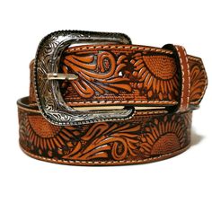 This leather belt for women is a dream accessory; a versatile piece you'll love and wear forever. Sumptuous LEATHER in rich brown tones is embossed with sunflowers and finished with a classic engraved buckle. The vintage vibe and Western-inspired design make it the perfect partner to your trusty blue jeans and boho dresses.  ✨✨Belts  are listed in sizes and  their  measurement in inches  and refers only to the leather strap (not including the buckle) *Made of GENUINE LEATHER and has a metal buck Womens Western Belt, Sunflower Belt, Hand-tooled Brown Belt Buckles For Western-themed Events, Western Style Brown Antique Belt Buckle, Western Brown Embroidered Belt, Western Belts For Women Coolbuckles.biz, Handmade Brown Western Belt, Womens Belts, Handmade Belt