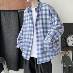 SPECIFICATIONSStyle: CasualStyle: casual /Harajuku /Vintage/Korean Style/Fashion/Japan/streetwear/hip hoSleeve Style: RegularSleeve Length(cm): FullShirts Type: Casual ShirtsSeason: Spring/Summer/AutumnPattern Type: PrintOrigin: CN(Origin)Offer: Dropshipping/Whosale/CustomModel Number: Men ShirtMaterial: CottonMaterial: PolyesterKeywords 5: men t shirt slim fit/summer shirts men 2020/vintage shirt men short slKeywords 4: shirts mens fashions/blusa social/men hawaiian shirt/plus size blouseKeywor Casual Baggy Tops, Casual Streetwear Shirt, Casual Winter Shirt, Blue Shirt For Streetwear In Fall, Spring Casual Streetwear Shirt, Casual Blue Shirt For Winter, Oversized Plaid Casual Top, Oversized Long Sleeve Retro Shirt, Casual Oversized Plaid Tops