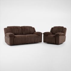 two brown couches sitting next to each other on a white surface with no one in it