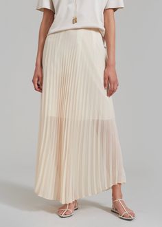 Color: Beige Lightweight fluid sheer fabric Relaxed silhouette Maxi length Pleating throughout Concealed side seam zip closure Partially lined 100% Polyester Dry Clean By The Frankie Shop. Imported Paris Store, Denim Suit, The Frankie Shop, Frankie Shop, Pleated Maxi Skirt, Paris Woman, Pleated Maxi, Leather Texture, Sheer Fabric