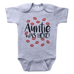 a baby bodysuit with the words, annie was here on it's chest