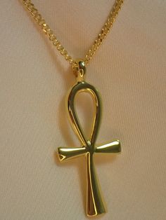 For Ready-to-ship items search here, https://etsy.me/39BDvMS Egyptian Ankh Cross Pendant Necklace / Sterling Silver Egypt Hieroglyphs pendant necklace / Protection Necklace / Egyptian Cross About Features- * Made to order * Materials: 925 Sterling Silver * Gold color: Yellow Gold Plating, White Gold Plating, and Rose Gold Plating * Pendant size: 31mm approx. * Layaway Plan Available * SKU: N161 Price is for a pair of earrings. If you need only one side, please message me for quote. As a referenc Spiritual Ankh Shaped Jewelry For Gifts, Spiritual Ankh Jewelry Gift, Spiritual Ankh Jewelry For Gifts, Nickel Free Ankh Jewelry Gift, Nickel-free Ankh Necklace As Gift, Symbolic Hallmarked Cross Jewelry, Symbolic Nickel-free Necklace For Anniversary, Nickel-free Symbolic Necklace For Anniversary, Nickel-free Ankh Jewelry Gift