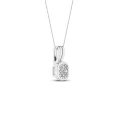 Enhance your elegance with our Coupled Cushion Bezel Necklace, a testament to sophistication and modern design. This exquisite diamond pendant necklace features a bezel-set, lab-grown cushion-cut diamond, radiating brilliance and clarity. Crafted with precision, the necklace boasts a unique double bail design, where two parallel bars elegantly cradle the diamond. The bars can be a combination of lustrous white and rose gold or white and yellow gold. This design not only enhances the beauty of th Square Pendant Diamond Necklace With Prong Setting, Formal White Gold Diamond Necklace With Square Pendant, Fine Jewelry Solitaire Square Pendant Necklace For Anniversary, Elegant Diamond Necklace With Square Pendant Accents, Anniversary White Gold Necklace With Square Pendant, Square Pendant Necklace With Bezel Setting For Anniversary, Modern White Gold Diamond Necklace With Prong Setting, Cushion Cut Diamond White Cubic Zirconia Necklace, Modern Solitaire Diamond Necklace With Accents