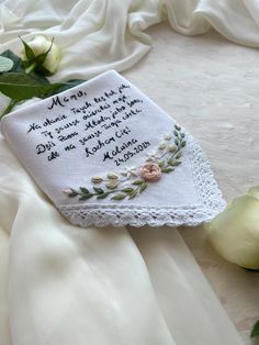 Hand-Embroidered Wedding Handkerchief with Floral Design.  Celebrate your special day with our beautifully crafted handkerchief, made from a luxurious linen-cotton blend. This unique piece is not only functional but also a sentimental keepsake for the bride and her beloved mother.  Fabric: Crafted from soft, durable linen-cotton fabric, this handkerchief offers a perfect balance of elegance and comfort, ideal for wiping away tears of joy. Words:  Handkerchief is embroidered with the touching wor Traditional Handmade Handkerchiefs As Gifts, Elegant Machine Embroidered Handkerchiefs For Gifts, Wedding Handkerchiefs With Machine Embroidery, Handmade White Handkerchiefs For Gift, Elegant Embroidered Handkerchiefs Gift, White Handmade Handkerchief As Gift, White Floral Embroidery Handkerchiefs For Gift, White Floral Embroidered Handkerchiefs For Gifts, Traditional Floral Embroidered Handkerchiefs As Gift