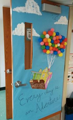 a door decorated to look like a house with balloons